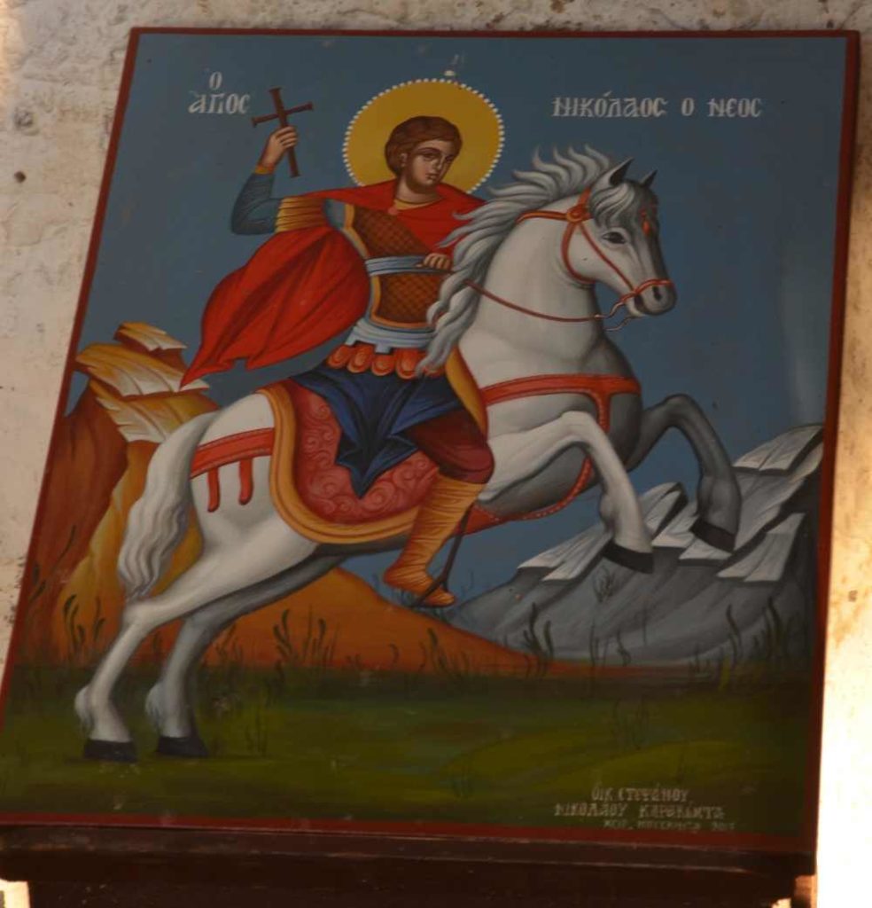 painting of st. nicholas riding white horse