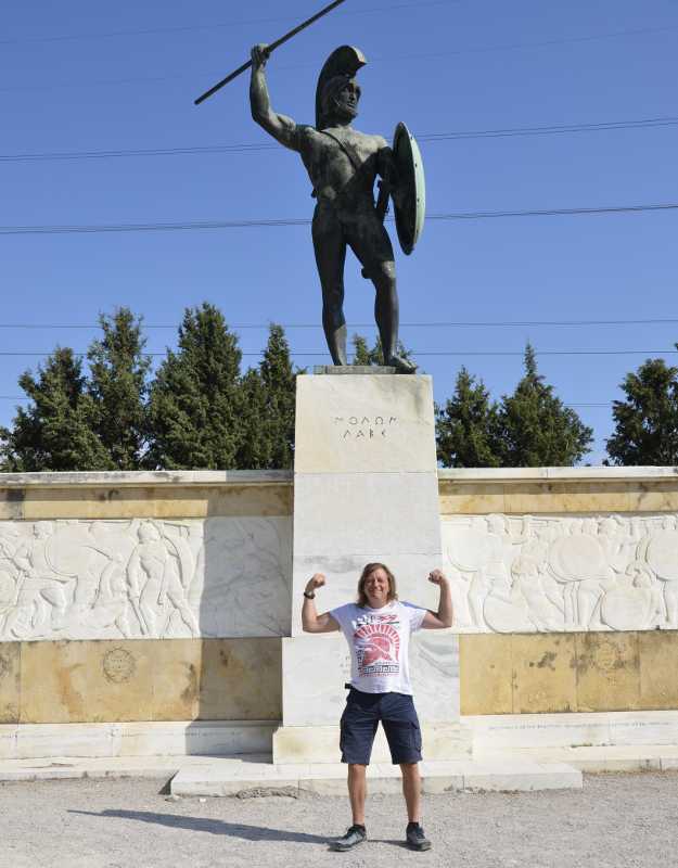 standing in front of the monument to king l eonidis at thermoplyes, greece