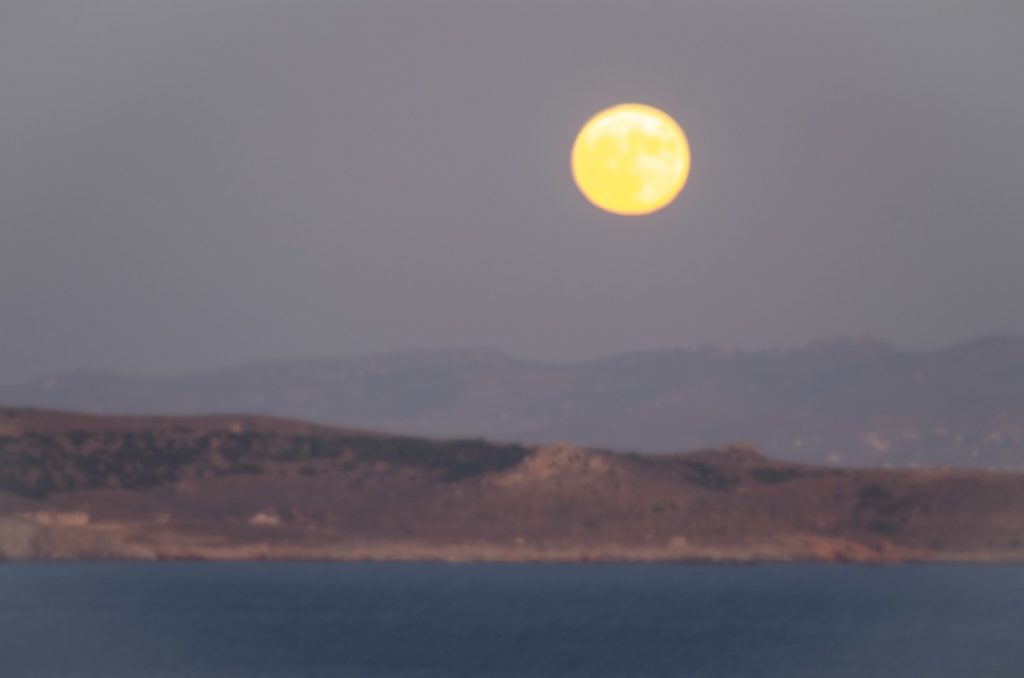 moon rising above makronisos