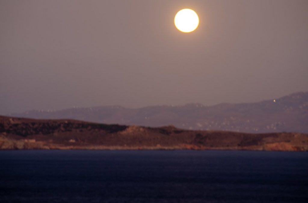moon rising over makronisos from cape sounion