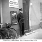 ruc constable john scott standing in front of ballyclare ruc detatchment