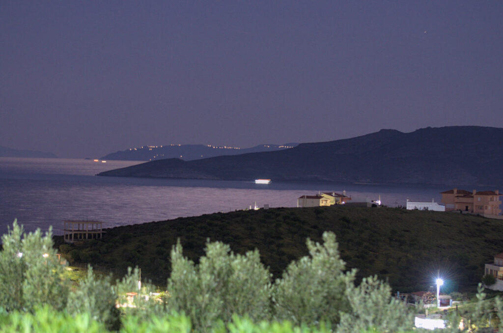 almost full moonlight shining on Makronisos and Aegean