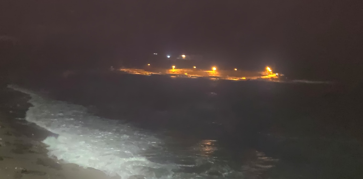 night photo of waves at vrompopousi beach, lavreotiki, greece